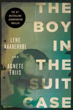 The boy in the suitcase  Cover Image