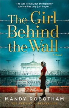 The girl behind the wall  Cover Image