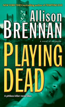 Playing dead : a novel of suspense  Cover Image