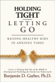 Go to record Holding tight, letting go : raising healthy kids in anxiou...